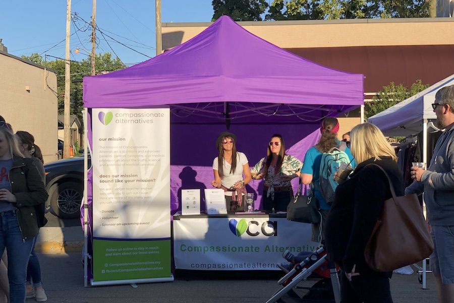 Compassionate Alternatives engaging the community directly at the Grandview Hop, Summer 2018